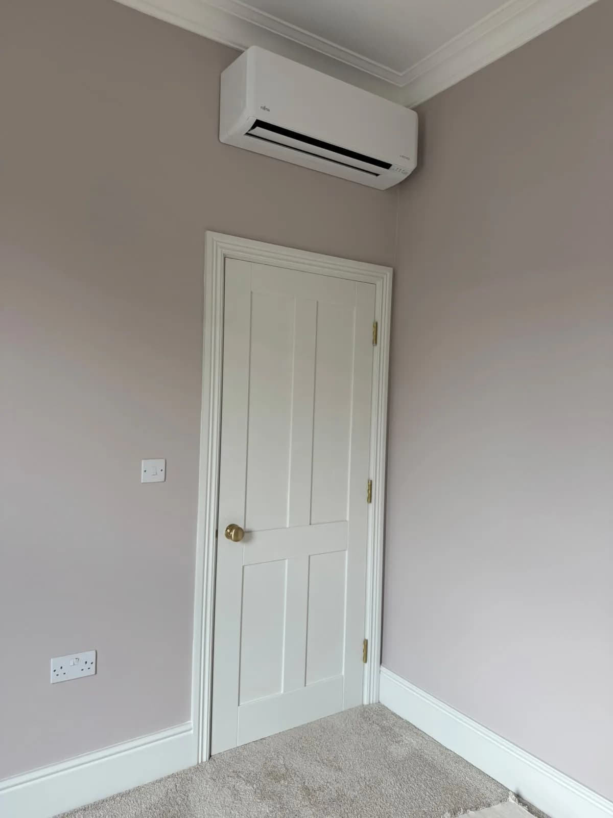 Box Room Retrofit - Fujitsu wall-mounted split air conditioning project by Knights
