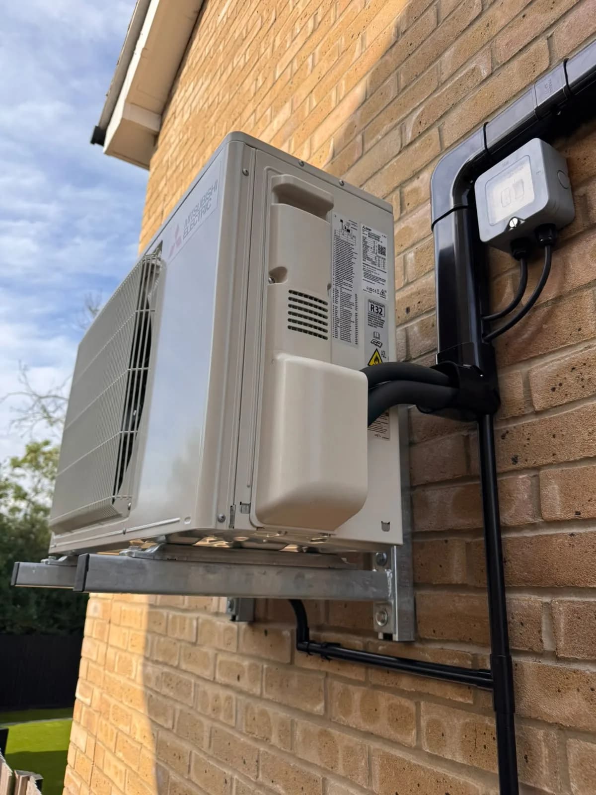 Residential Condenser Installation - Mitsubishi Electric outdoor unit air conditioning project by Knights