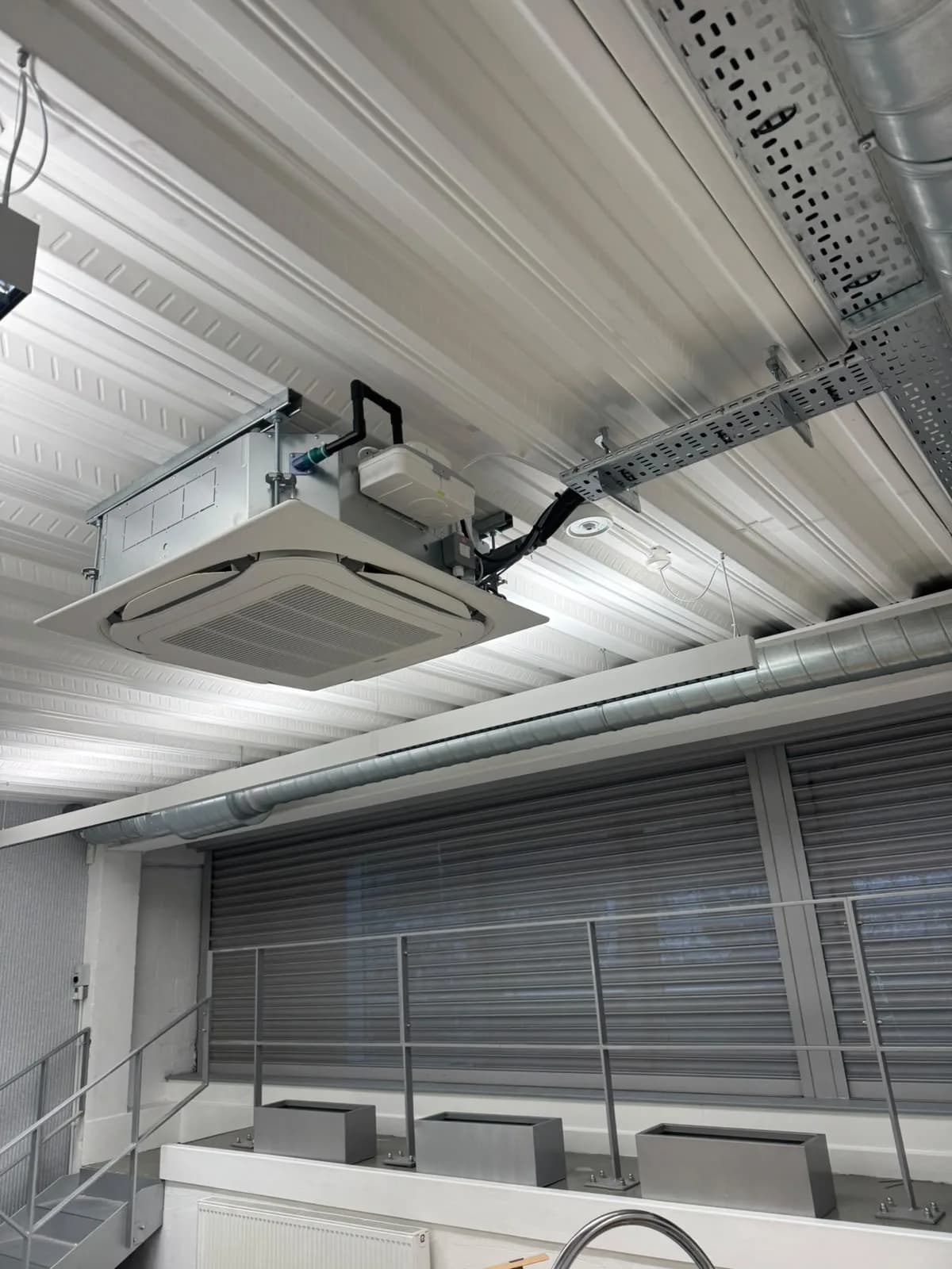 Ceiling cassette air conditioning unit installed in a commercial server room in Stevenage